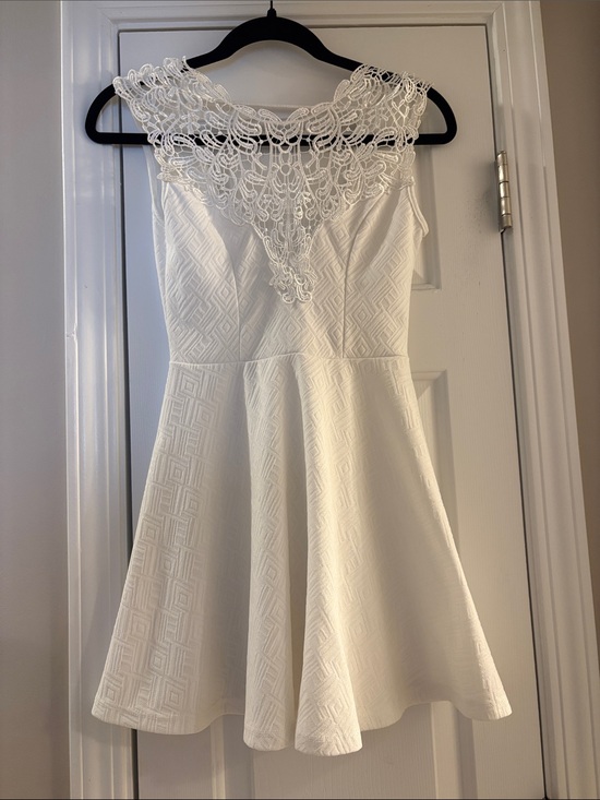 Francesca's Collections Dresses & Skirts - Elegant White Lace Dress with Bow on Back